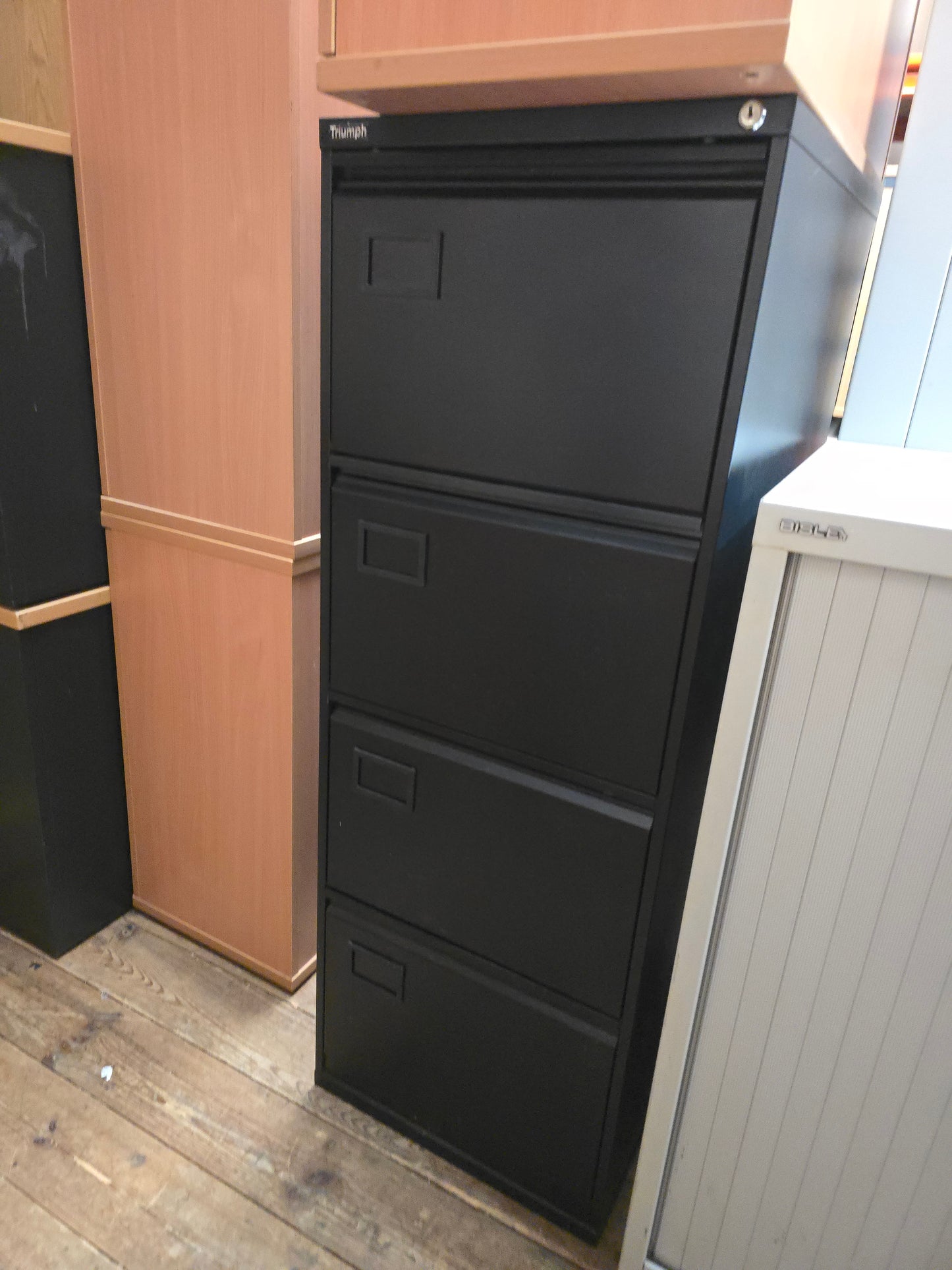 Triumph 4 draw filing cabinet.